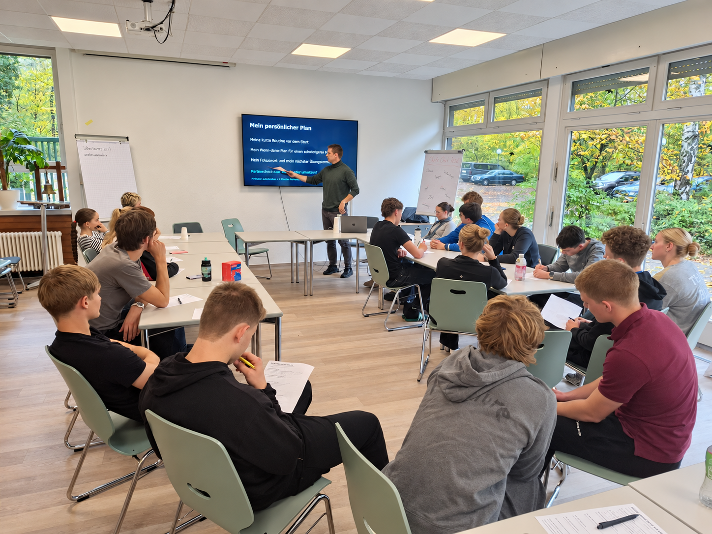 Igor running a mental performance workshop with junior rowers in Berlin
